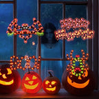 Spooksy™ 4-Pack Halloween Lighted Window Silhouette Lights, LED Hanging Ornaments with Cobweb, Pumpkin, Cat and Skull Designs